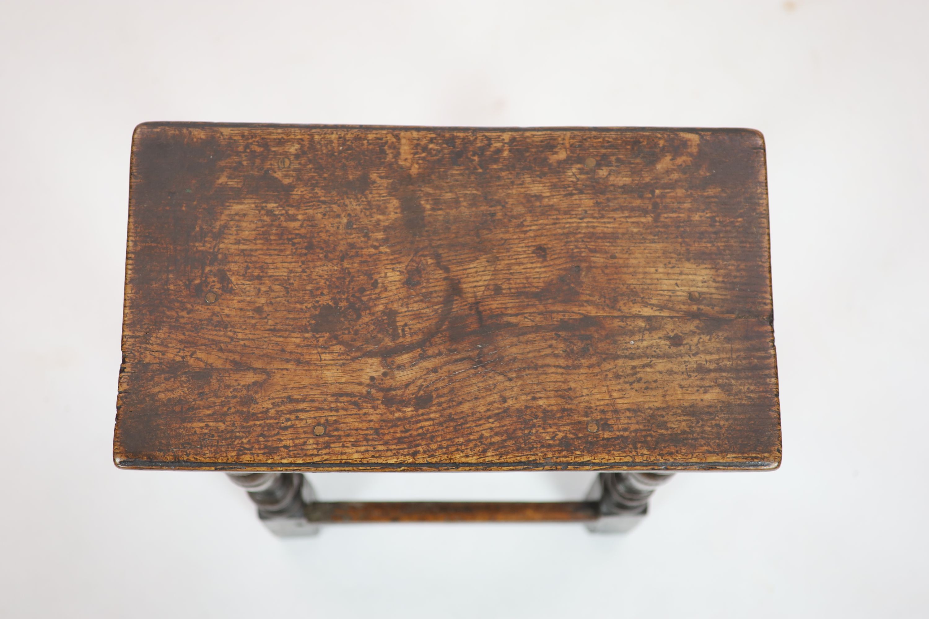 A Charles I oak joint stool, H 54cm. W 48cm. D 27cm.